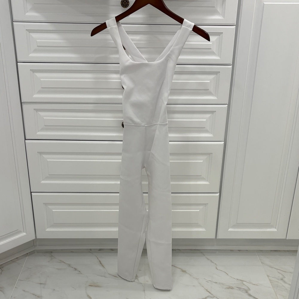 Heros Active White Cross-Back Onesie Jumpsuit in white. Extra small.